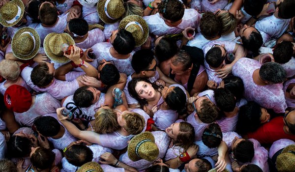 Running of the Bulls in Pamplona, Spain Photograph by David Ramos, Getty Images Space is tight for onlookers during opening day of the San Fermin Festival&#039;s Running of the Bulls in Pamplona, Spain. Held since 1591, the event attracts tens of thousands of visitors each year for nine days of revelry, morning bull runs, and afternoon bullfights. The festival gained worldwide fame after appearing in Ernest Hemingway&#039;s 1926 novel The Sun Also Rises.