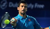Djokovic tries to cool tennis pay row