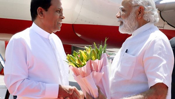 Maithri returns after strengthening ties with India