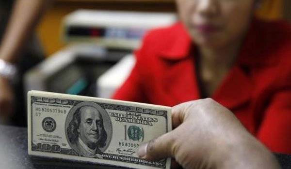 Dollar top performer among major currencies in 2014