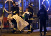Paris attacks leave at least 120 dead