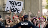 Topless FEMEN runs wild in Paris