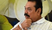 Reject OHCHR report, Mahinda tells govt.
