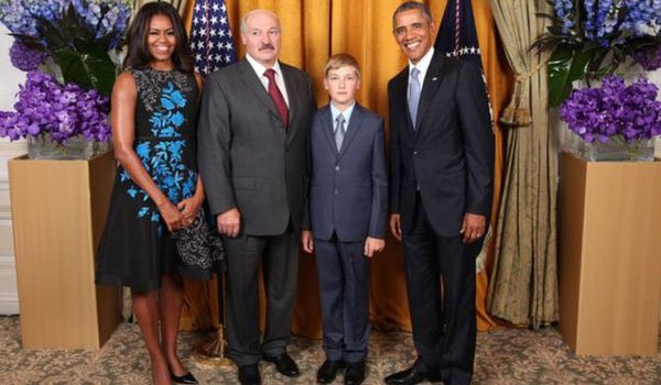 Why does Belarus President Lukashenko take son Kolya to work?