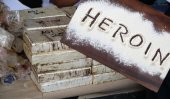 Racketeers get back seized heroin?