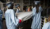 Emma takes rape-protest mattress to graduation