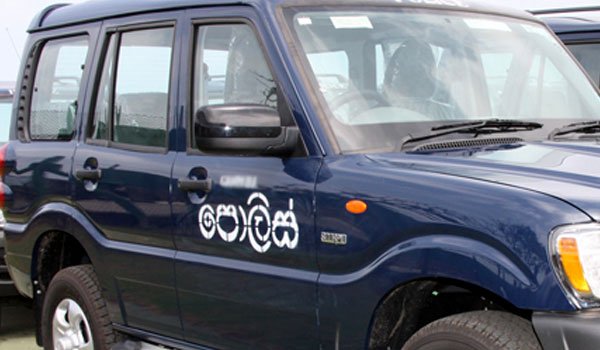 Poster-removing police team in road mishap