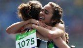 True Olympic spirit : 2 athletes help each other mid-race