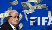 Prankster showers Sepp Blatter with fake dollar bills