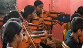 Ethnic Sinhalese and Tamil children are bridging post-war divisions through music [Dinouk Colombage/Al Jazeera]