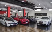3 Asians empty car showroom in owner&#039;s absence