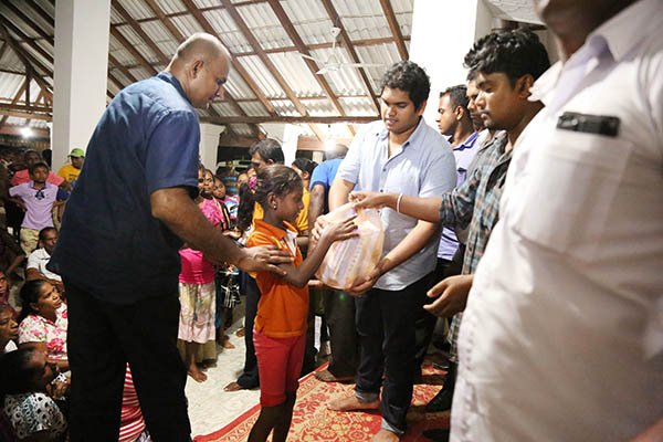 President’s son in flood relief distribution