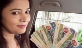 Nethu poses with media pass