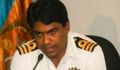 Foreign travel ban on ex-Navy spokesman