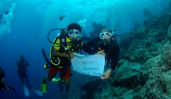 Underwater protest staged in Maldives to free former president Mohamed Nasheed